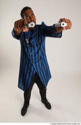 Garson STANDING POSE WITH GUNS 